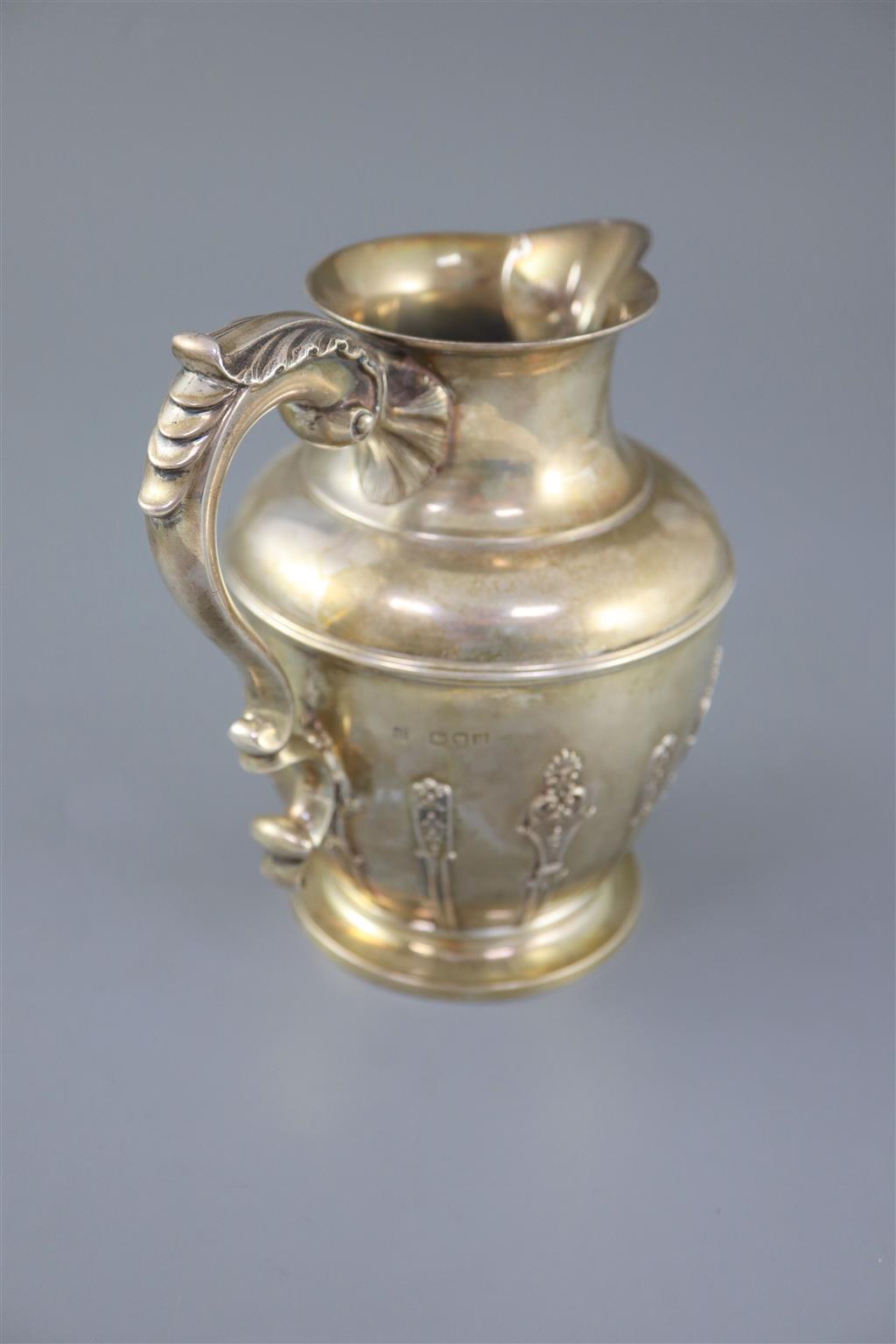 A late Victorian silver baluster jug, by Aldwinckle & Slater,